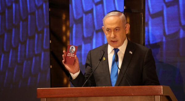 epa11336577 Israeli Prime Minister Benjamin Netanyahu addresses a ceremony marking Memorial Day for fallen soldiers of Israel’s wars and victims of attacks at Israel's Mount Herzl national military cemetery in Jerusalem, 13 May 2024. Israel marks Memorial Day (Yom HaZikaron) to commemorate fallen soldiers and victims of attacks recorded since 1860 by the defence ministry.  EPA/GIL COHEN-MAGEN / POOL