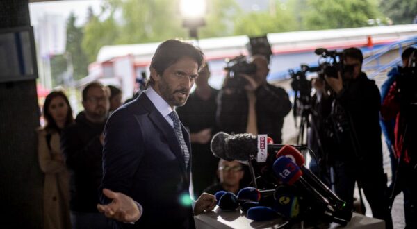 epa11347794 Slovak Defence Minister and Deputy Prime Minister Robert Kalinak (front C) addresses the media outside the F. D. Roosevelt University Hospital, where Slovak Prime Minister Robert Fico is being treated after being shot two days earlier, in Banska Bystrica, Slovakia, 17 May 2024. The Slovak government office on 15 May confirmed there had been an assassination attempt on Prime Minister Robert Fico following a meeting in the town of Handlova. According to the director of the hospital Miriam Lapunikova, Fico is conscious and stable at the time, but he is still placed in the Anesthesiology and Resuscitation unit. She said that his condition is 'truly very serious'.  EPA/MARTIN DIVISEK