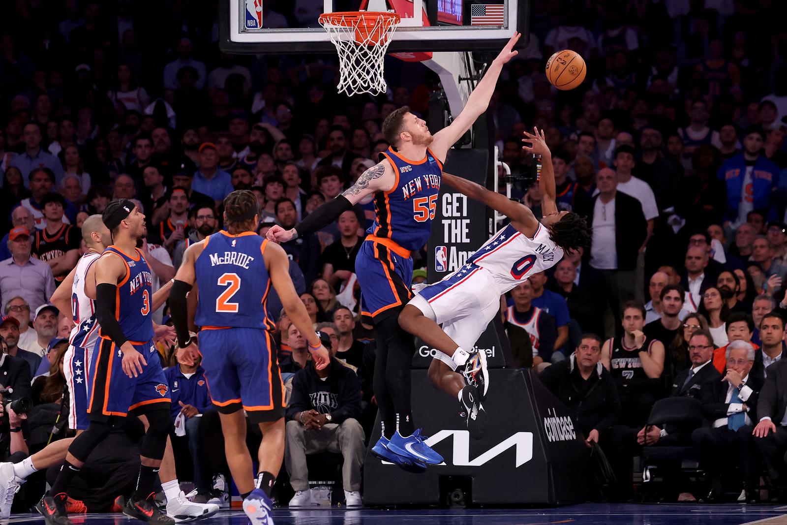 Apr 30, 2024; New York, New York, USA; New York Knicks center Isaiah Hartenstein (55) defends a shot by Philadelphia 76ers guard Tyrese Maxey (0) during overtime in game 5 of the first round of the 2024 NBA playoffs at Madison Square Garden. Mandatory Credit: Brad Penner-USA TODAY Sports Photo: Brad Penner/REUTERS