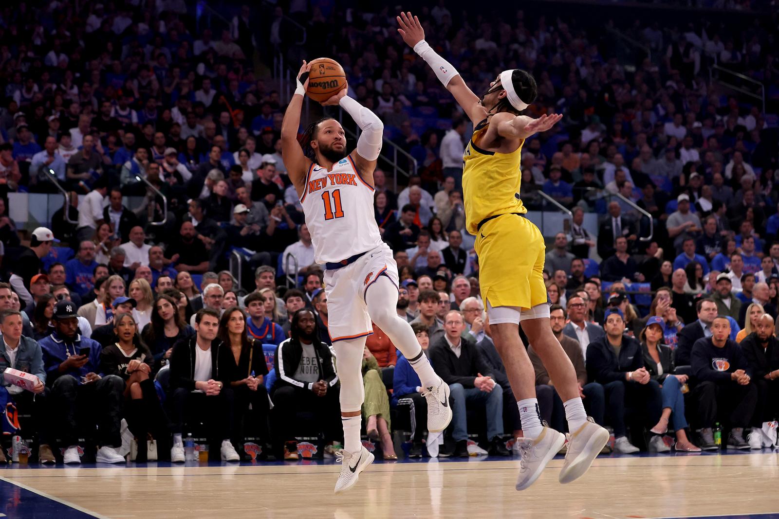 May 6, 2024; New York, New York, USA; New York Knicks guard Jalen Brunson (11) takes a shot against Indiana Pacers guard Andrew Nembhard (2) during the first quarter of game one of the second round of the 2024 NBA playoffs at Madison Square Garden. Mandatory Credit: Brad Penner-USA TODAY Sports Photo: Brad Penner/REUTERS