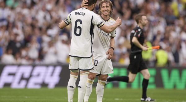 May 4, 2024, Madrid, Spain: Luka Modric (R) of Real Madrid CF and Jose Ignacio Fernandez Iglesias, known as Nacho Fernandez (L) of Real Madrid CF in action during the 2023/2024 La Liga EA Sports week 34 football match between Real Madrid CF and Cadiz CF at Santiago Bernabeu stadium. Final score: Real Madrid CF 3:0 Cadiz CF.,Image: 870391652, License: Rights-managed, Restrictions: , Model Release: no, Credit line: Federico Titone / Zuma Press / Profimedia