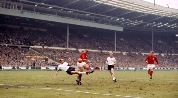 File photo dated 30-07-1966 of (L-R) West Germany's Willi Schulz challenges England's Roger Hunt, watched by teammate Karl-Heinz Schnellinger and England's Alan Ball (right).,Image: 518584511, License: Rights-managed, Restrictions: FILE PHOTO, Model Release: no, Credit line: PA Photos / PA Images / Profimedia