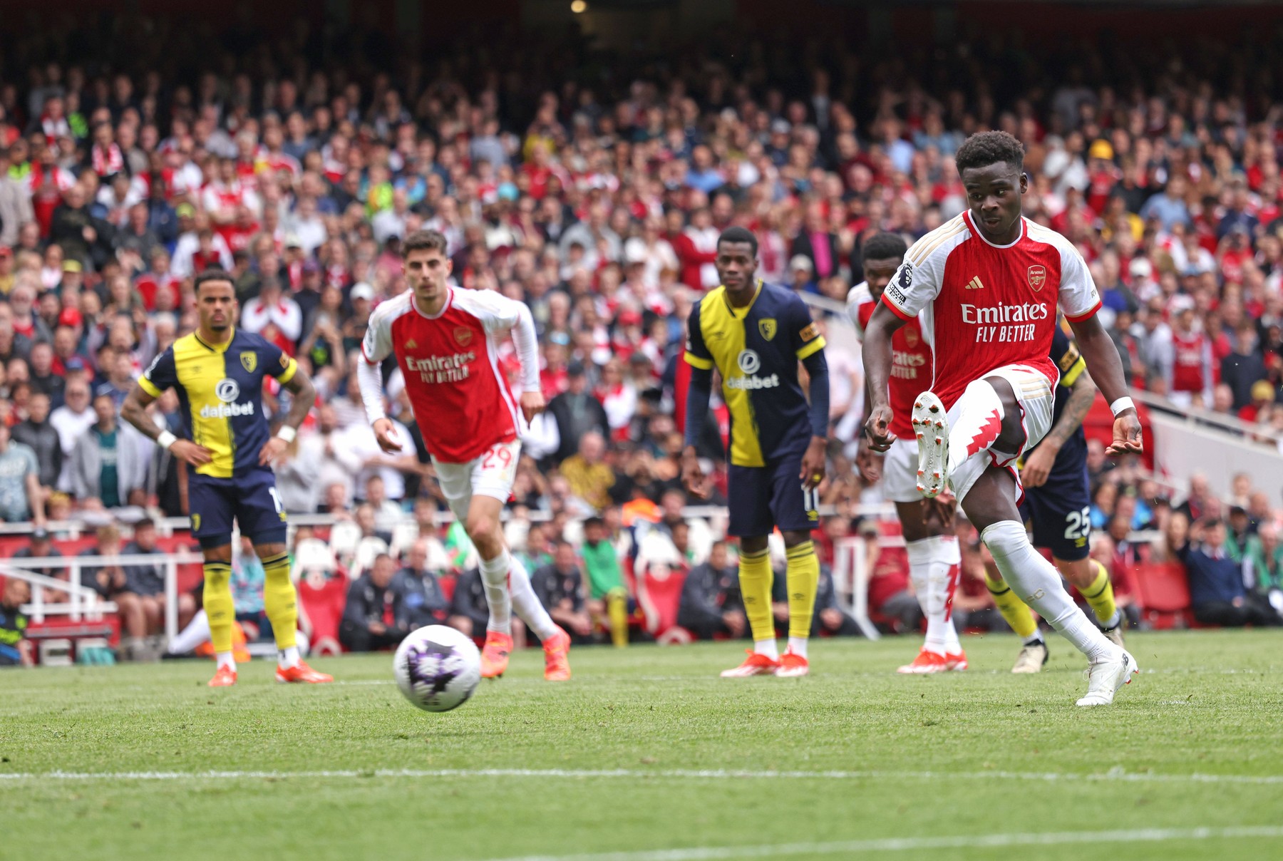 Bukayo Saka A scores from the penalty spot for the first Arsenal goal 1-0 at the Arsenal v AFC Bournemouth EPL match, at the Emirates Stadium, London, UK on 4th May, 2024.,Image: 870157436, License: Rights-managed, Restrictions: PUBLICATIONxNOTxINxUK, Credit images as "Profimedia/ IMAGO", Model Release: no, Credit line: Paul Marriott / imago sportfotodienst / Profimedia