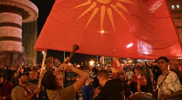 Supporters of the North Macedonian opposition party VMRO-DPMNE celebrate their party's victory in Skopje on May 8, 2024. North Macedonia appeared to be on a collision course with its EU neighbours Greece and Bulgaria, as the nationalist opposition swept parliamentary and presidential elections.,Image: 871291319, License: Rights-managed, Restrictions: , Model Release: no, Credit line: Armend NIMANI / AFP / Profimedia