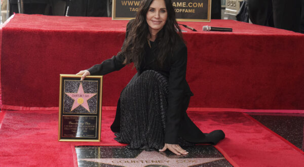 Actress and filmmaker Courteney Cox is honored with a star on the Hollywood Walk of Fame on Monday, Feb. 27, 2023 in Los Angeles. (AP Photo/Damian Dovarganes)