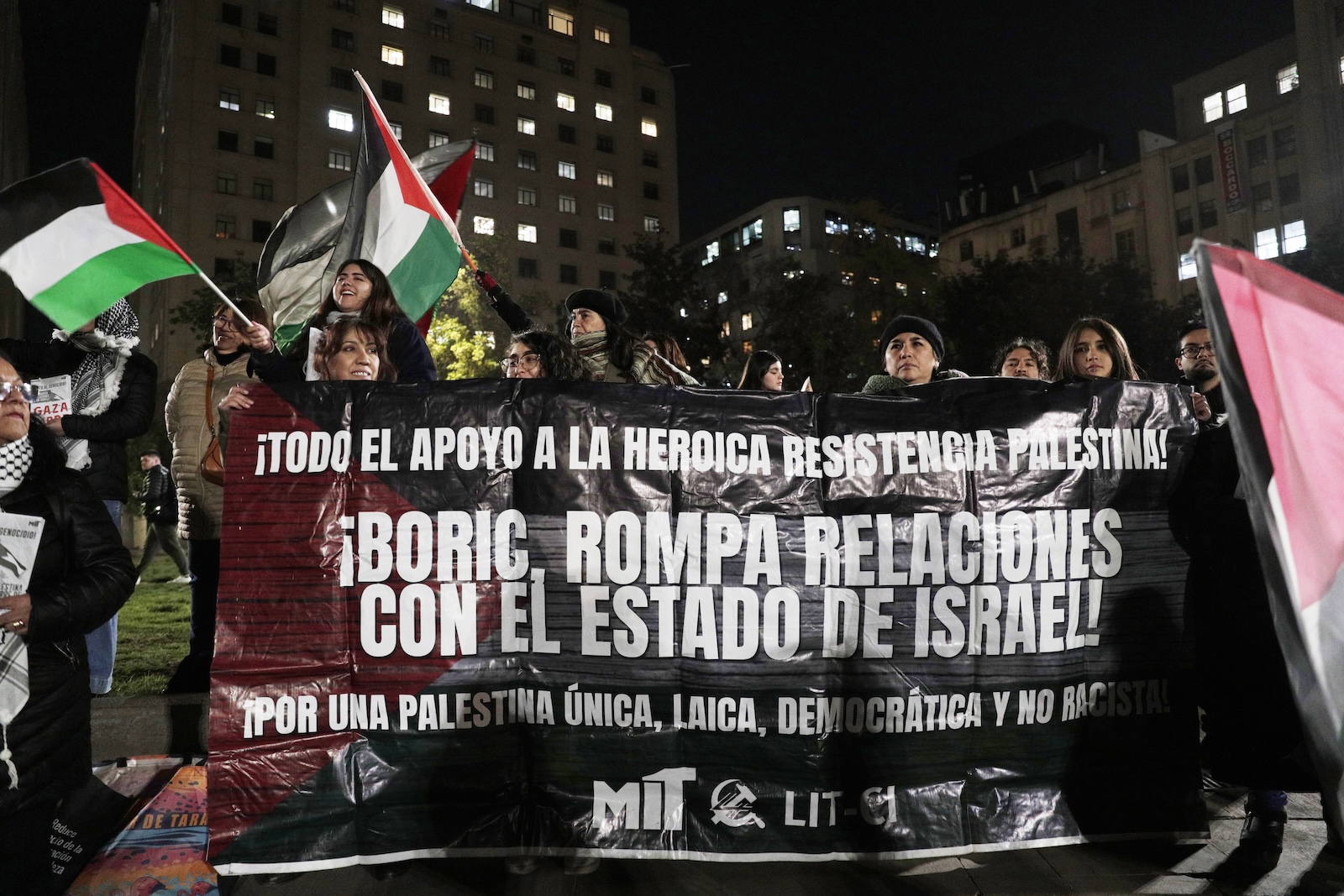 epa11346520 Dozens of people demonstrate to demand the government of President Gabriel Boric to break diplomatic relations with Israel, in addition to taking concrete measures to 'contribute to the end of the genocide' of the Palestinian people, in Santiago, Chile, 16 May 2024. In front of the Palacio de la Moneda (seat of the Chilean Government), hundreds of people of all ages gathered with music, flags and banners, with the motto 'For a free Palestine', on the occasion of the 76th anniversary of the 'Nakba', the massive displacement of Palestinians following the creation of the State of Israel in 1948.  EPA/Elvis GonzÃ¡lez