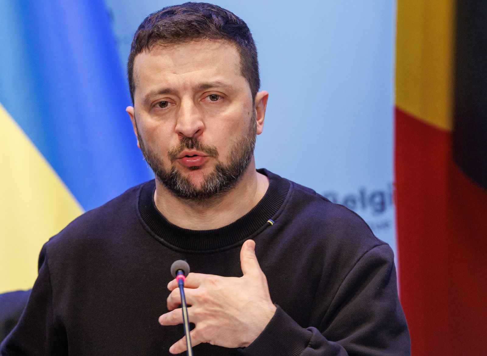 epa11374882 Ukraine's President Volodymyr Zelensky gestures as he addresses the media alongside Belgium's Prime Minister during a surprise visit at the Prime Minister's office in Brussels, Belgium, 28 May 2024. Zelensky visits Belgium to ink the latest in a string of security accords with Western allies. The two leaders will discuss, among other things, Belgium's military support to Ukraine and the signing of a bilateral security agreement, including the supply of F-16 fighter jets as part of the security agreement.  EPA/OLIVIER MATTHYS