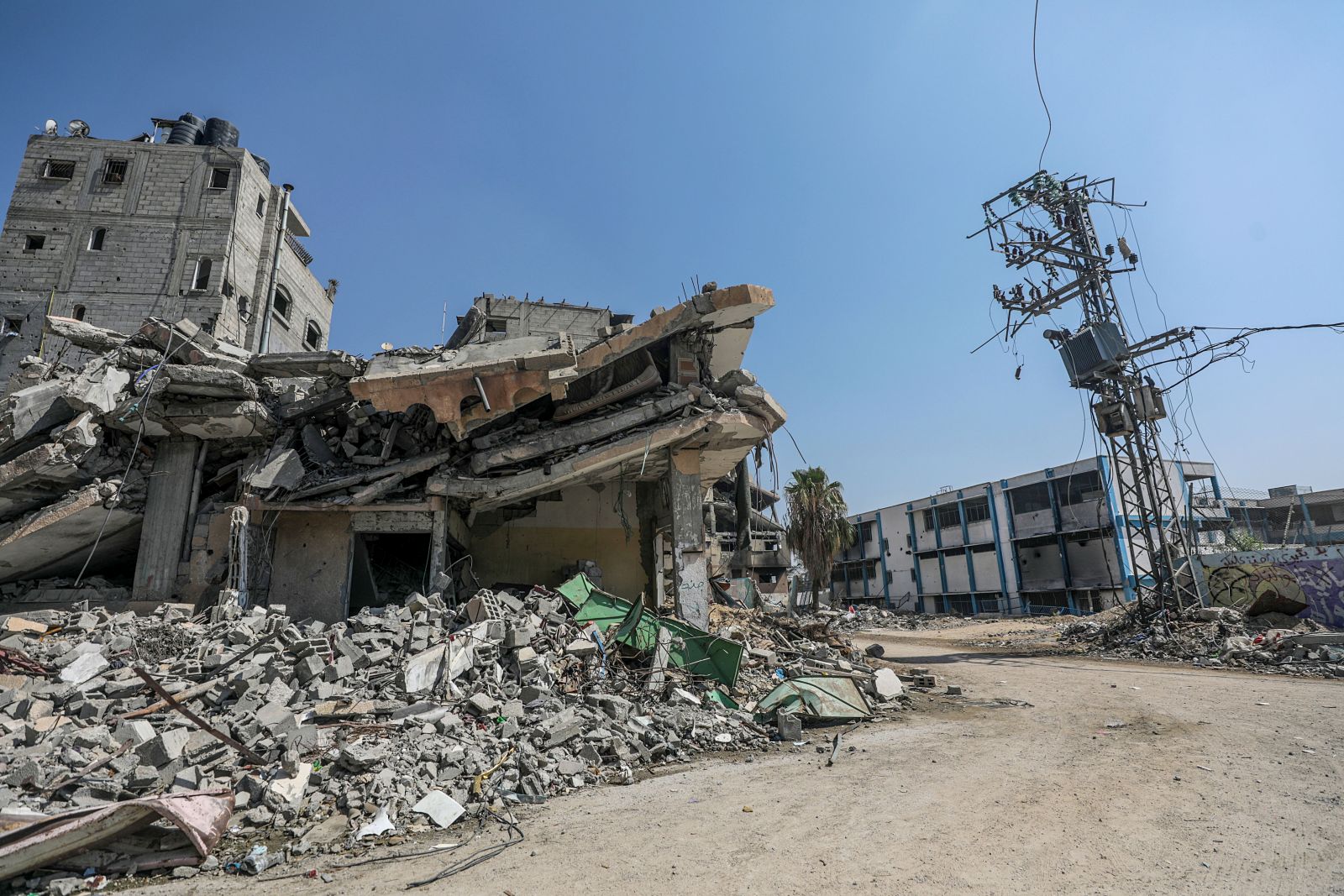 epa11391020 A view of sestroyed buildings during an Israeli military operation in Al Bureij refugee camp, central Gaza Strip, 05 June 2024. The Israeli military stated on 05 June that Israeli troops started a 'targeted operational activity' in the areas of Bureij and eastern Deir al Balah both 'above and below ground' in the area. More than 36,000 Palestinians and over 1,400 Israelis have been killed, according to the Palestinian Health Ministry and the Israel Defense Forces (IDF), since Hamas militants launched an attack against Israel from the Gaza Strip on 07 October 2023, and the Israeli operations in Gaza and the West Bank which followed it.  EPA/MOHAMMED SABER