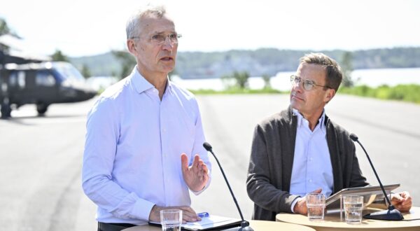 epa11395088 NATO Secretary General Jens Stoltenberg (L) and Sweden's Prime Minister Ulf Kristersson hold a news conference in connection with bilateral talks and a demonstration of the Swedish Armed Forces' activities at the Stockholm Amphibian Regiment in Berga, Sweden, 07 June 2024. Stoltenberg is in Sweden from 06 to 07 June to attend Sweden's National Day and a military demonstration by the Swedish Armed Forces.  EPA/HENRIK MONTGOMERY SWEDEN OUT