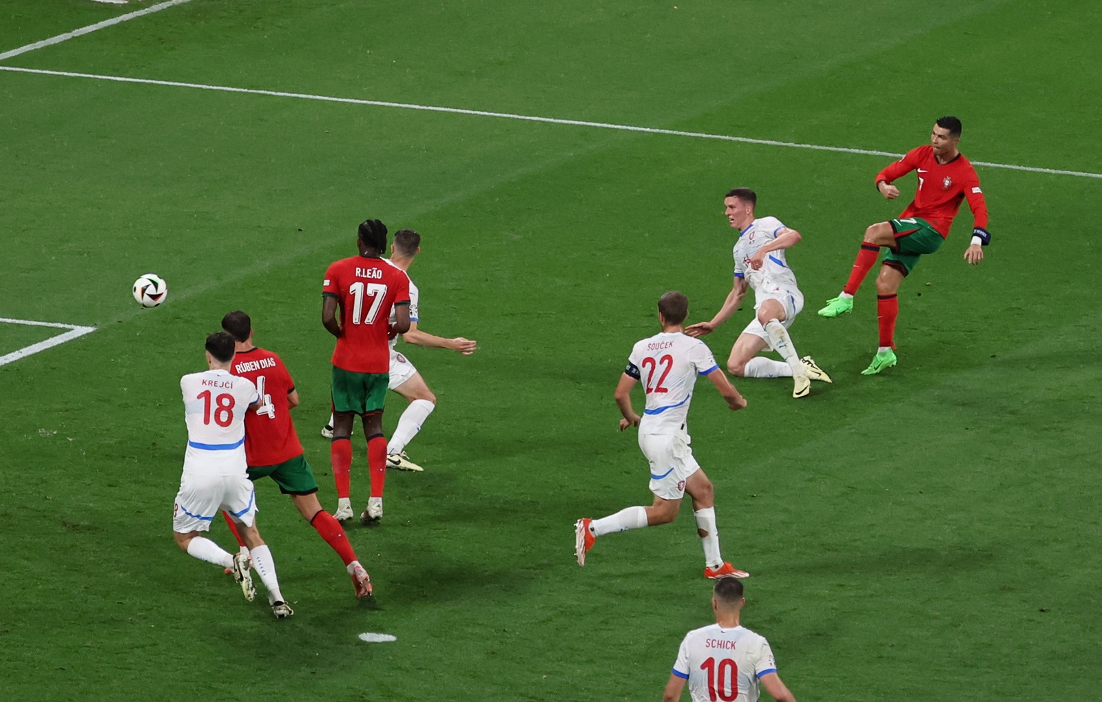 epa11420988 Cristiano Ronaldo of Portugal (R) attempts a shot on goal during the UEFA EURO 2024 group F match between Portugal and Czech Republic, in Leipzig, Germany, 18 June 2024.  EPA/ABEDIN TAHERKENAREH