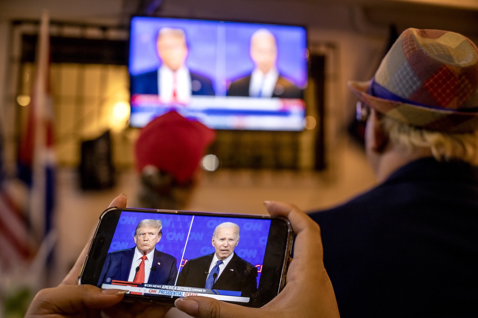 epa11442467 Trump supporters observe the first 2024 presidential election debate between US President Joe Biden and former President Donald J. Trump during a watch party in Miami, Florida, USA, 27 June 2024. The first 2024 US presidential election debate is hosted by CNN in Atlanta, Georgia.  EPA/CRISTOBAL HERRERA-ULASHKEVICH