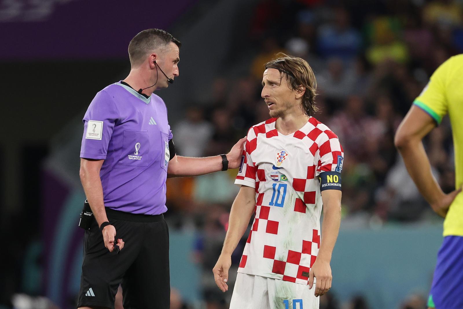 09.12.2022., stadion Education City, Al Rayyan, Katar - FIFA Svjetsko prvenstvo, cetvrtfinale, Hrvatska - Brazil. Luka Modric, Michael Oliver Photo: Goran Stanzl/PIXSELL