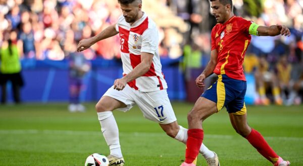 15.06.2024., Olimpijski stadion, Berlin, Njemacka - Europsko prvenstvo 2024., skupina B, 1. kolo, Spanjolska - Hrvatska. Bruno Petkovic, Rodri. Photo: Marko Lukunic/PIXSELL