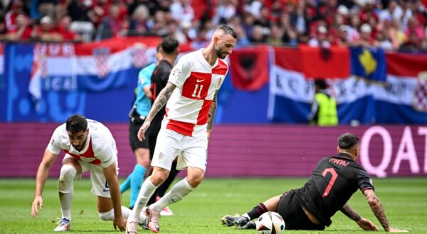 19.06.2024., Volksparkstadion, Hamburg, Njemacka - Europsko prvenstvo 2024., skupina B, 2. kolo, Hrvatska - Albanija. Marcelo Brozovic, Rey Manaj. Photo: Marko Lukunic/PIXSELL