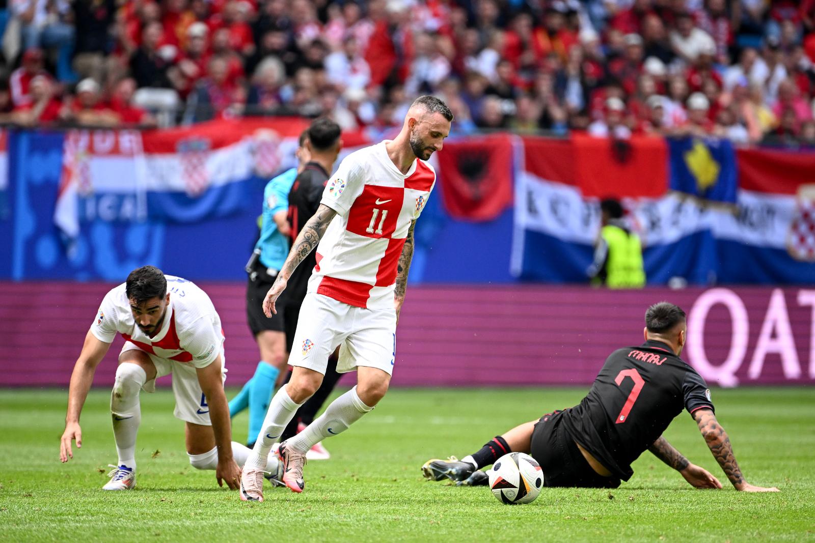 19.06.2024., Volksparkstadion, Hamburg, Njemacka - Europsko prvenstvo 2024., skupina B, 2. kolo, Hrvatska - Albanija. Marcelo Brozovic, Rey Manaj. Photo: Marko Lukunic/PIXSELL