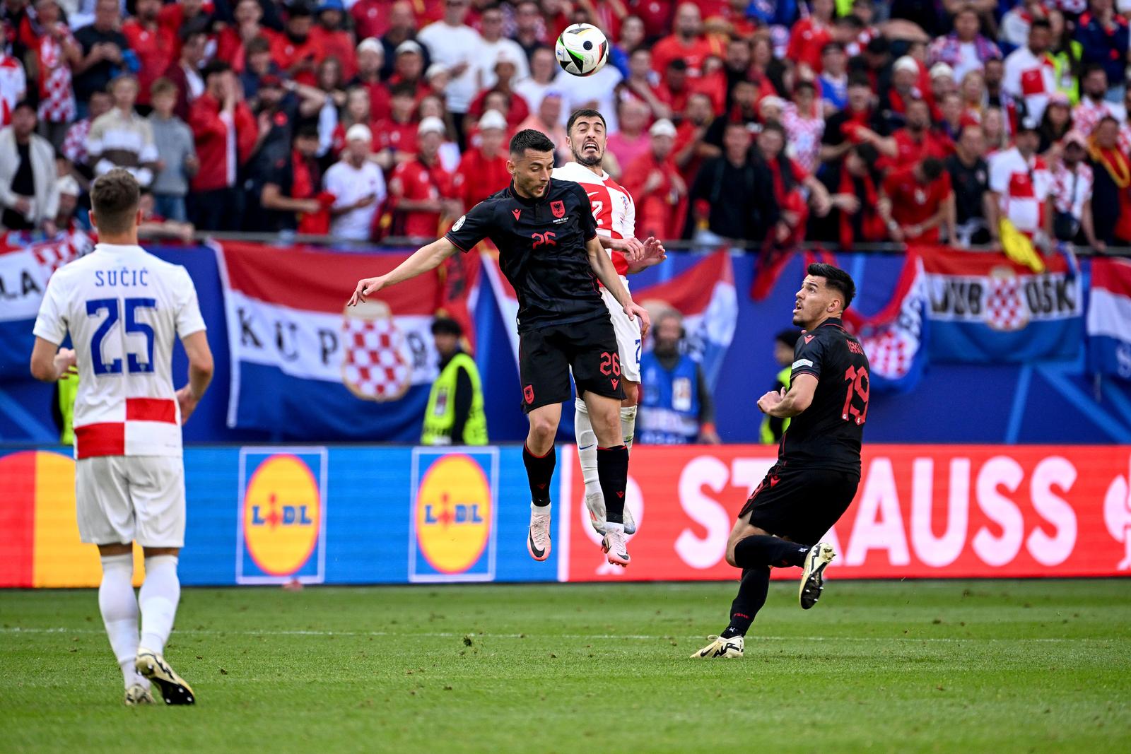 19.06.2024., Volksparkstadion, Hamburg, Njemacka - Europsko prvenstvo 2024., skupina B, 2. kolo, Hrvatska - Albanija. Josip Juranovic, Arber Hoxha Photo: Marko Lukunic/PIXSELL