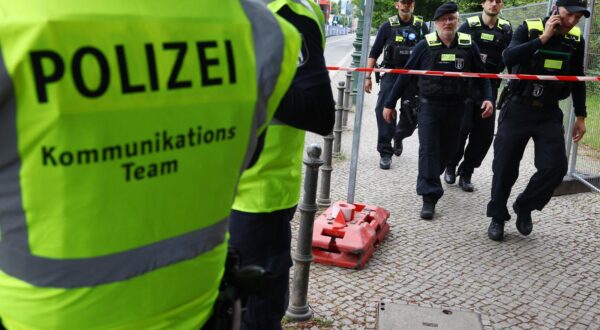 Soccer Football - Euro 2024 - Fans in Berlin gather at a fan zone to watch Germany v Scotland - Brandenburg Gate, Berlin, Germany - June 14, 2024 Police officers are pictured at the Reichstag fan zone after clearing it for safety reasons REUTERS/Lisi Niesner Photo: LISI NIESNER/REUTERS
