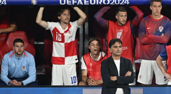Soccer Football - Euro 2024 - Group B - Croatia v Italy - Leipzig Stadium, Leipzig, Germany - June 24, 2024  Croatia's Luka Modric with teammates and coach Zlatko Dalic react REUTERS/Annegret Hilse Photo: Annegret Hilse/REUTERS