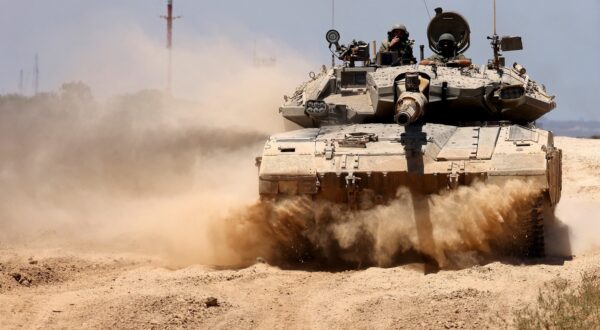 An Israeli army tank rolls to take position in an area along Israel's southern border with the Palestinian Gaza Strip on June 18, 2024, amid the ongoing conflict between Israel and the Palestinian militant group Hamas.,Image: 882688558, License: Rights-managed, Restrictions: , Model Release: no, Credit line: JACK GUEZ / AFP / Profimedia