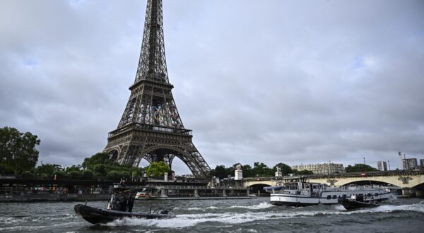 (FILES) Police boats participate in a technical navigation rehearsal on the Seine river for the opening ceremony of the Paris 2024 Olympic Games, in Paris, on June 17, 2024. The rehearsal of the opening ceremony of the Olympic Games, which was due to be held on June 24 with the entire fleet of boats, has been postponed due to the high flow of the Seine, AFP learned on June 21 from the prefecture of the Ile-de-France region.,Image: 883682607, License: Rights-managed, Restrictions: , Model Release: no, Credit line: JULIEN DE ROSA / AFP / Profimedia