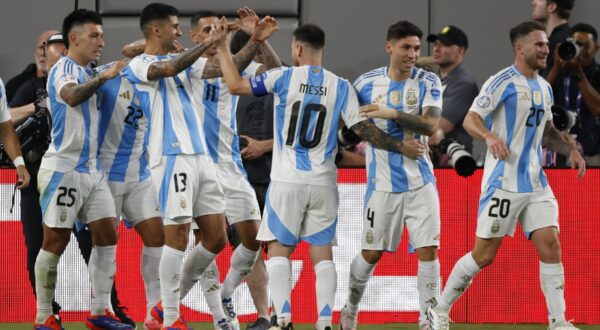 Argentina's players celebrate after scoring a goal during the Conmebol 2024 Copa America tournament group A football match between Chile and Argentina at MetLife Stadium in East Rutherford, New Jersey on June 25, 2024.,Image: 884736141, License: Rights-managed, Restrictions: , Model Release: no, Credit line: EDUARDO MUNOZ / AFP / Profimedia