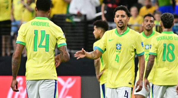 Brazil's defender #04 Marquinhos and teammates celebrate after winning the Conmebol 2024 Copa America tournament group D football match between Paraguay and Brazil at Allegiant Stadium in Las Vegas, Nevada on June 28, 2024.,Image: 885630117, License: Rights-managed, Restrictions: , Model Release: no, Credit line: Frederic J. Brown / AFP / Profimedia