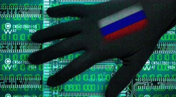 Black hand with Russia flag about computer boards, symbolic photo Cyberattacken, Schwarze Hand mit Russland-Fahne ueber Computerplatinen, Symbolfoto Cyberattacken,Image: 327852934, License: Rights-managed, Restrictions: , Model Release: no, Credit line: Bildagentur-online/O hde / Alamy / Alamy / Profimedia