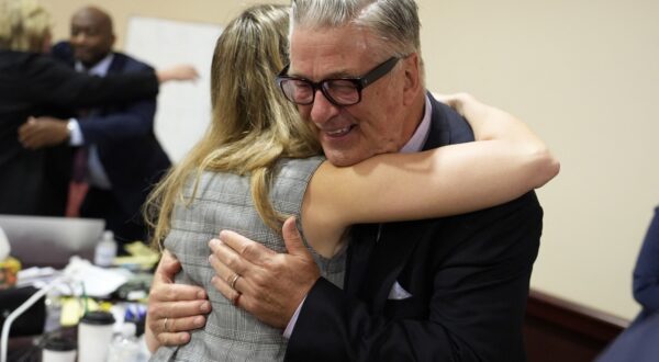 US actor Alec Baldwin hugs a member of his legal team at the conclucion of his trial on involuntary manslaughter at Santa Fe County District Court in Santa Fe, New Mexico, on July 12, 2024.  Baldwin's trial for involuntary manslaughter was dismissed by a judge Friday after she ruled that key evidence over a fatal shooting on the set of "Rust" had been withheld from the defense.,Image: 889366427, License: Rights-managed, Restrictions: , Model Release: no, Credit line: RAMSAY DE GIVE / AFP / Profimedia