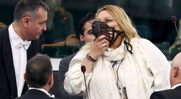 MEP Diana Iovanovici Sosoaca (R) wears a muzzle as EU Commission president nominee delivers a speech during her statement for her candidacy at the European Parliament in Strasbourg, eastern France, on July 18, 2024.,Image: 890555798, License: Rights-managed, Restrictions: ALTERNATIVE CROP, Model Release: no, Credit line: FREDERICK FLORIN / AFP / Profimedia