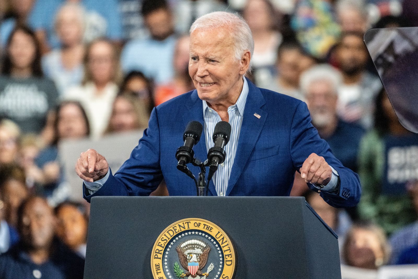 epa11443802 US President Joe Biden speaks to the crowd during a campaign event at the Jim Graham Building at the North Carolina State Fairgrounds in Raleigh, North Carolina, USA, 28 June 2024.  EPA/STAN GILLILAND