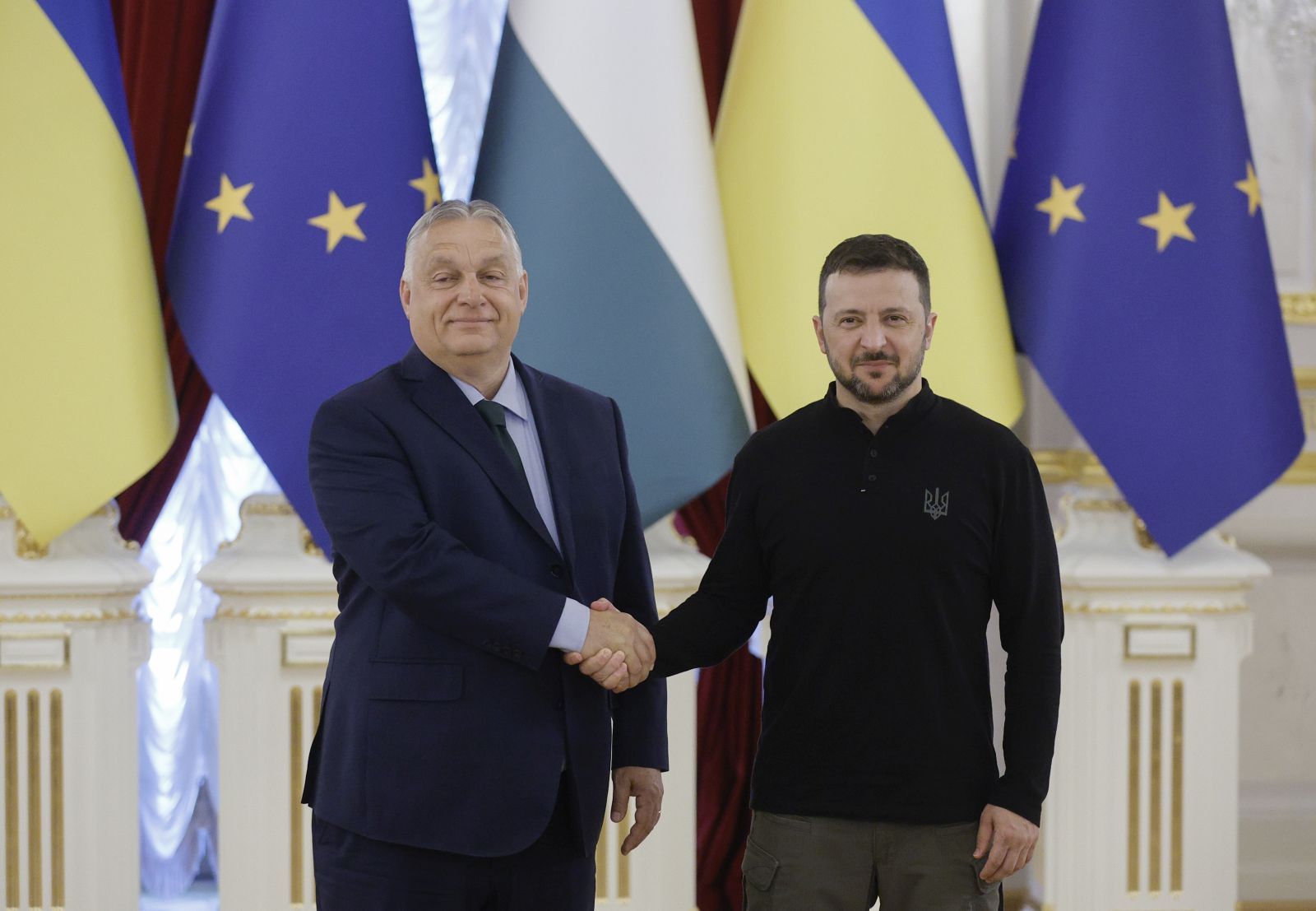 epa11452149 Ukrainian President Volodymyr Zelensky (R) shakes hands with Hungarian Prime Minister Viktor Orban (L), during their meeting in Kyiv, Ukraine, 02 July 2024. The Hungarian prime minister arrived in Kyiv to discuss 'European peace' with the Ukrainian president as well as current issues in Hungarian-Ukrainian bilateral relations, the Hungarian government spokesman Zoltan Kovacs said. This is Orban's first official visit to Ukraine since the beginning of the Russian invasion in 2022.  EPA/SERGEY DOLZHENKO
