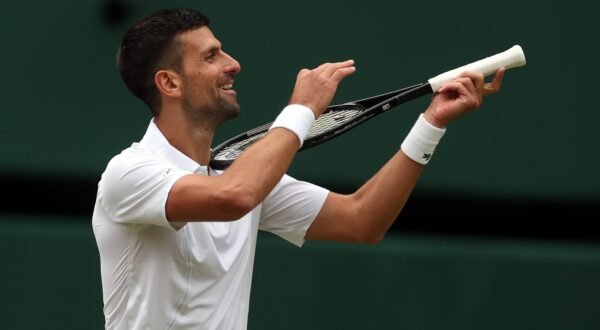 epa11474980 Novak Djokovic of Serbia reacts after winning the Men's semifinal match against Lorenzo Musetti of Italy at the Wimbledon Championships, Wimbledon, Britain, 12 July 2024.  EPA/NEIL HALL  EDITORIAL USE ONLY