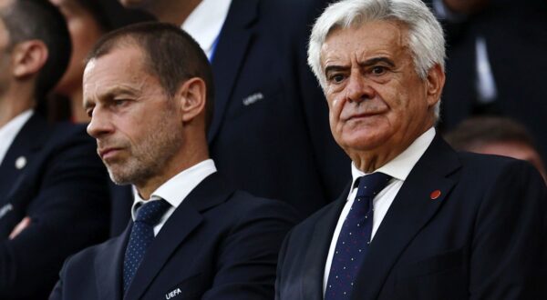 epa11448774 UEFA President Aleksander Ceferin (L) and Pedro Rocha (R), president of Spanish football association RFEF, look on prior the UEFA EURO 2024 Round of 16 soccer match between Spain and Georgia, in Cologne, Germany, 30 June 2024.  EPA/ANNA SZILAGYI