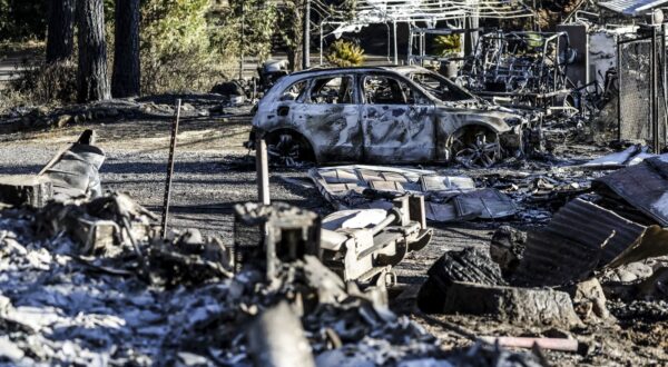 epa11498494 The burned remains destroyed by the Park Fire, which has currently burned  over 170,000 acres according to the California Department of Forestry and Fire Protection (Cal Fire), in Butte County, California, USA, 26 July 2024. According to a press release from Butte County District Attorney Mike Ramsey, a 42-year-old man from Chico, California was arrested for allegedly pushing a burning car into a gully which set off the Park Fire. As of today, according to Cal Fire, the fire was 0 percent contained.  EPA/JOHN G. MABANGLO