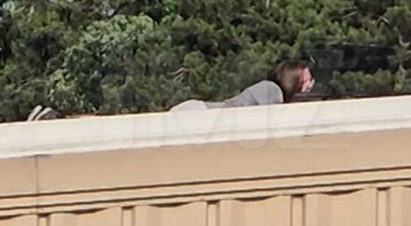 Butler,, PA  - *PREMIUM-EXCLUSIVE*  - The Trump rally gunman was laid out on his belly, took aim and fired shots into the crowd before he got met with incoming bullets that killed him ... and TMZ has it all on video.

We've obtained an incredible clip that shows the moment the gunman opened fire at the Butler, PA rally Saturday -- and you can see the guy looking through either a scope or iron sights on a roof ... with people watching down below and freaking out, their panic palpable.  
The guy has longer brown hair, and he seems to be wearing a grey shirt/khaki pants -- and as you can see, he's carefully trying pinpoint a target from afar before pulling the trigger.

BACKGRID USA 13 JULY 2024,Image: 889595517, License: Rights-managed, Restrictions: , Model Release: no, Pictured: Shooter, Credit line: TMZ / BACKGRID / Backgrid USA / Profimedia