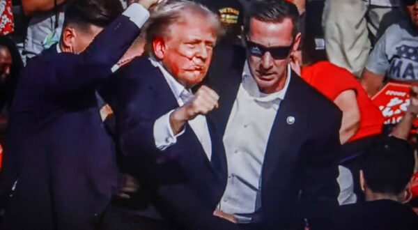 July 14, 2024, Butler, Pennsylvania, United States: In this photo illustration, a screen shows Former US President Donald Trump shot in the ear at a rally he was holding in Butler. Former US President Donald Trump was wounded in a shooting at a rally he was holding in Butler, Pennsylvania as part of his election campaign ahead of the 2024 US Presidential election. According to the latest reports, secret agents killed a shooter and one rally participant died at the hands of the shooter himself, the shooting at the rally is being investigated as an attempted assassination of former President Trump, the Associated Press reports, citing the Butler County District Attorney.
14 Jul 2024
Pictured: July 14, 2024, Butler, Pennsylvania, United States: In this photo illustration, a screen shows Former US President Donald Trump shot in the ear at a rally he was holding in Butler. Former US President Donald Trump was wounded in a shooting at a rally he was holding in Butler, Pennsylvania as part of his election campaign ahead of the 2024 US Presidential election. According to the latest reports, secret agents killed a shooter and one rally participant died at the hands of the shooter himself, the shooting at the rally is being investigated as an attempted assassination of former President Trump, the Associated Press reports, citing the Butler County District Attorney.,Image: 889593171, License: Rights-managed, Restrictions: NO Argentina, Australia, Bolivia, Brazil, Chile, Colombia, Finland, France, Georgia, Hungary, Japan, Mexico, Netherlands, New Zealand, Poland, Romania, Russia, South Africa, Uruguay, Model Release: no, Credit line: ZUMAPRESS.com / MEGA / The Mega Agency / Profimedia