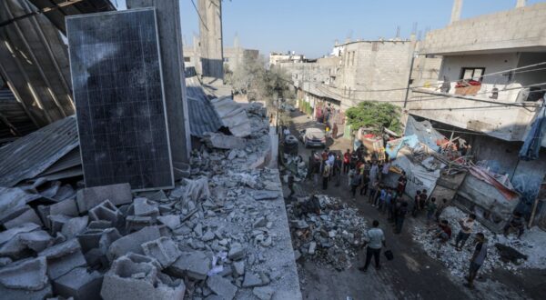 epa11484878 Palestinians inspect the destroyed home of the Muheisen family following an Israeli air strike in the Al Zwaida neighbourhood in the central Gaza Strip, 18 July 2024. According to a report from the Ministry of Health in Gaza, six Palestinians, members of the Muheisen family, were killed following an Israeli air strike in the Central Gaza Strip. More than 38,000 Palestinians and over 1,400 Israelis have been killed, according to the Palestinian Health Ministry and the Israel Defense Forces (IDF), since Hamas militants launched an attack against Israel from the Gaza Strip on 07 October 2023, and the Israeli operations in Gaza and the West Bank which followed it.  EPA/MOHAMMED SABER