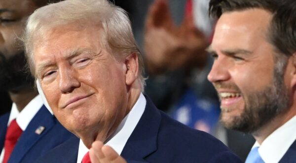 Former US President and 2024 Republican presidential candidate Donald Trump sits next to US Senator from Ohio and 2024 Republican vice presidential candidate J. D. Vance (R) during the first day of the 2024 Republican National Convention at the Fiserv Forum in Milwaukee, Wisconsin, July 15, 2024. Donald Trump won formal nomination as the Republican presidential candidate and picked a right-wing loyalist for running mate, kicking off a triumphalist party convention in the wake of last weekend's failed assassination attempt.,Image: 889940760, License: Rights-managed, Restrictions: , Model Release: no, Credit line: ANDREW CABALLERO-REYNOLDS / AFP / Profimedia