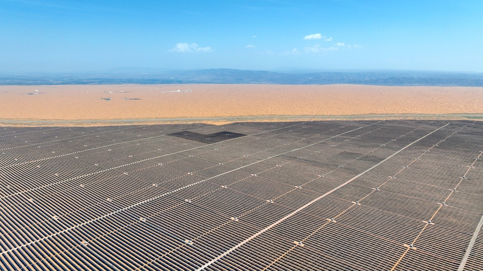 ZHONGWEI, CHINA - MAY 09: Aerial view of the second phase of China s largest renewable energy power base under construction at Tengger Desert on May 9, 2024 in Zhongwei, Ningxia Hui Autonomous Region of China. The project will provide about 3.96 billion kilowatt-hours of clean electricity annually after completion. Copyright: xVCGx 111495348206,Image: 871659941, License: Rights-managed, Restrictions: imago is entitled to issue a simple usage license at the time of provision. Personality and trademark rights as well as copyright laws regarding art-works shown must be observed. Commercial use at your own risk.;PUBLICATIONxNOTxINxCHN, Credit images as "Profimedia/ IMAGO", Model Release: no, Credit line: IMAGO / imago stock&people / Profimedia