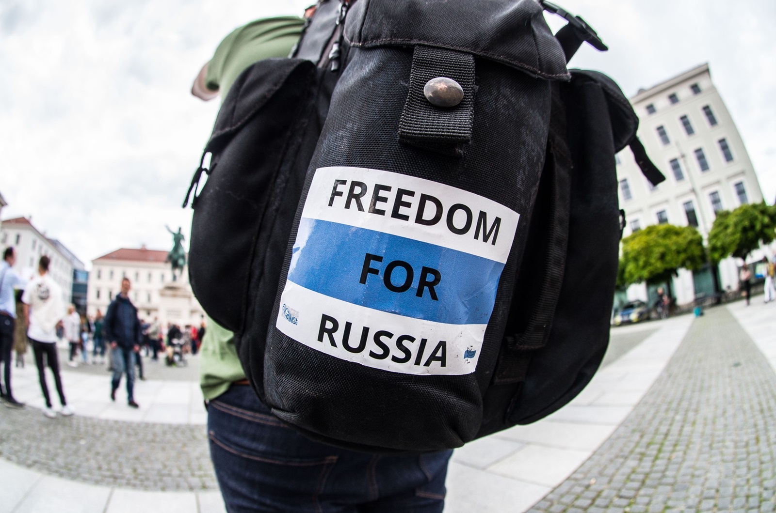 May 9, 2023, Munich, Bavaria, Germany: Members of the Russian opposition hold signs with the victims of russia's war, as well as stickers demanding freedom for Russia. Coinciding with worldwide Victory Day celebrations, Munich saw another Immortal Regiment demo that was this time led by Amid Saidi, who organized the putinist demo in 2022. Originally conceived by Russian journalists Sergei Kolotovkin, Sergei Lapenkov, and Igor Dmitriev, to have non-militarized commemorations of those who fought in WWII, the Immortal Regiment (Ger: unsterbliches Regiment) has been seen since 2015 as part of the Putin regime's hybrid warfare and expansionist offensives in the world outside of Russia.  Critics, which include the founders of the movement, state that the actions are part of historical revisionism of Russia's role in the war where Russia actively tries to diminish the role of Western world and monopolize the WWII victory. Critics in Munich see the demo as tasteless due to the war in Ukraine and the fact that the demos are largely directed by pro-Kremlin actors, such as the registrant of the name Nikolai Zemtsov.,Image: 774793718, License: Rights-managed, Restrictions: , Model Release: no, Credit line: Sachelle Babbar / Zuma Press / Profimedia