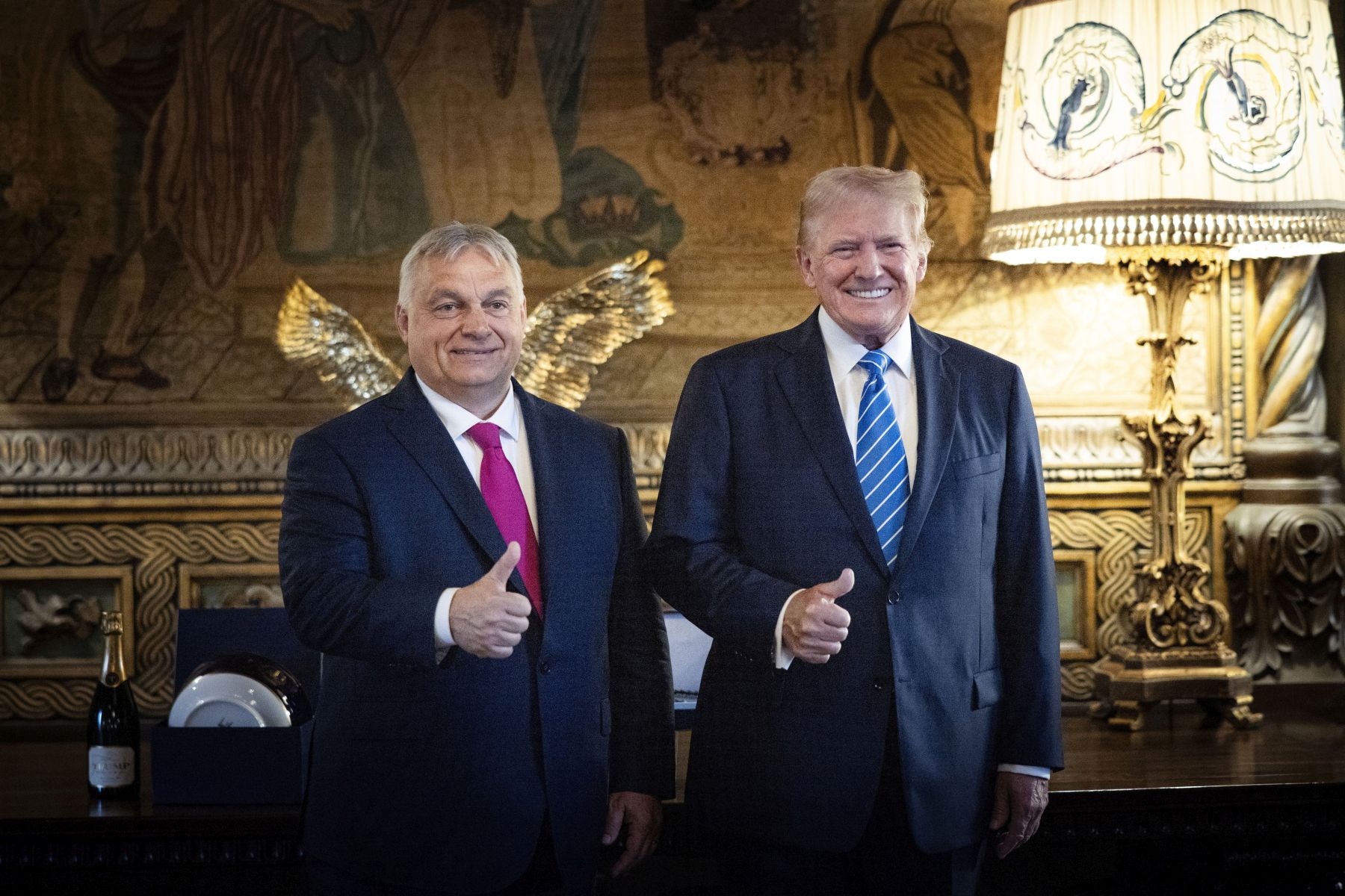 epa11473669 A handout photo made available bythe Hungarian PM’s Press Office shows Hungarian Prime Minister Viktor Orban (L) and former US president and Republican presidential candidate Donald Trump (R) posing for photographs during their meeting in Trump's Mar-a-Lago estate in Palm Beach, Florida, USA, 11 July 2024.  EPA/Zoltan Fischer HANDOUT HUNGARY OUTHANDOUT EDITORIAL USE ONLY/NO SALES
