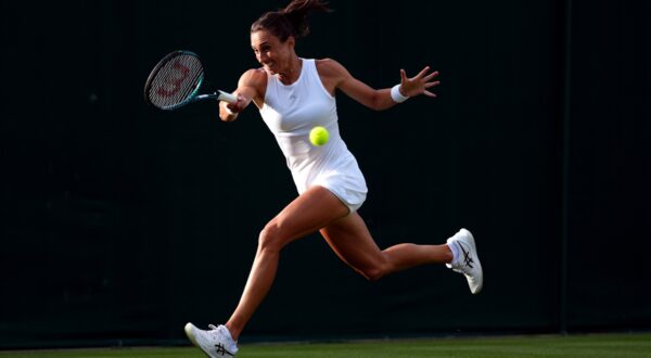 Petra Martic in action against Francesca Jones (not pictured) on day two of the 2024 Wimbledon Championships at the All England Lawn Tennis and Croquet Club, London. Picture date: Tuesday July 2, 2024.,Image: 886707622, License: Rights-managed, Restrictions: Editorial use only. No commercial use without prior written consent of the AELTC. Still image use only - no moving images to emulate broadcast. No superimposing or removal of sponsor/ad logos., Model Release: no, Credit line: John Walton / PA Images / Profimedia