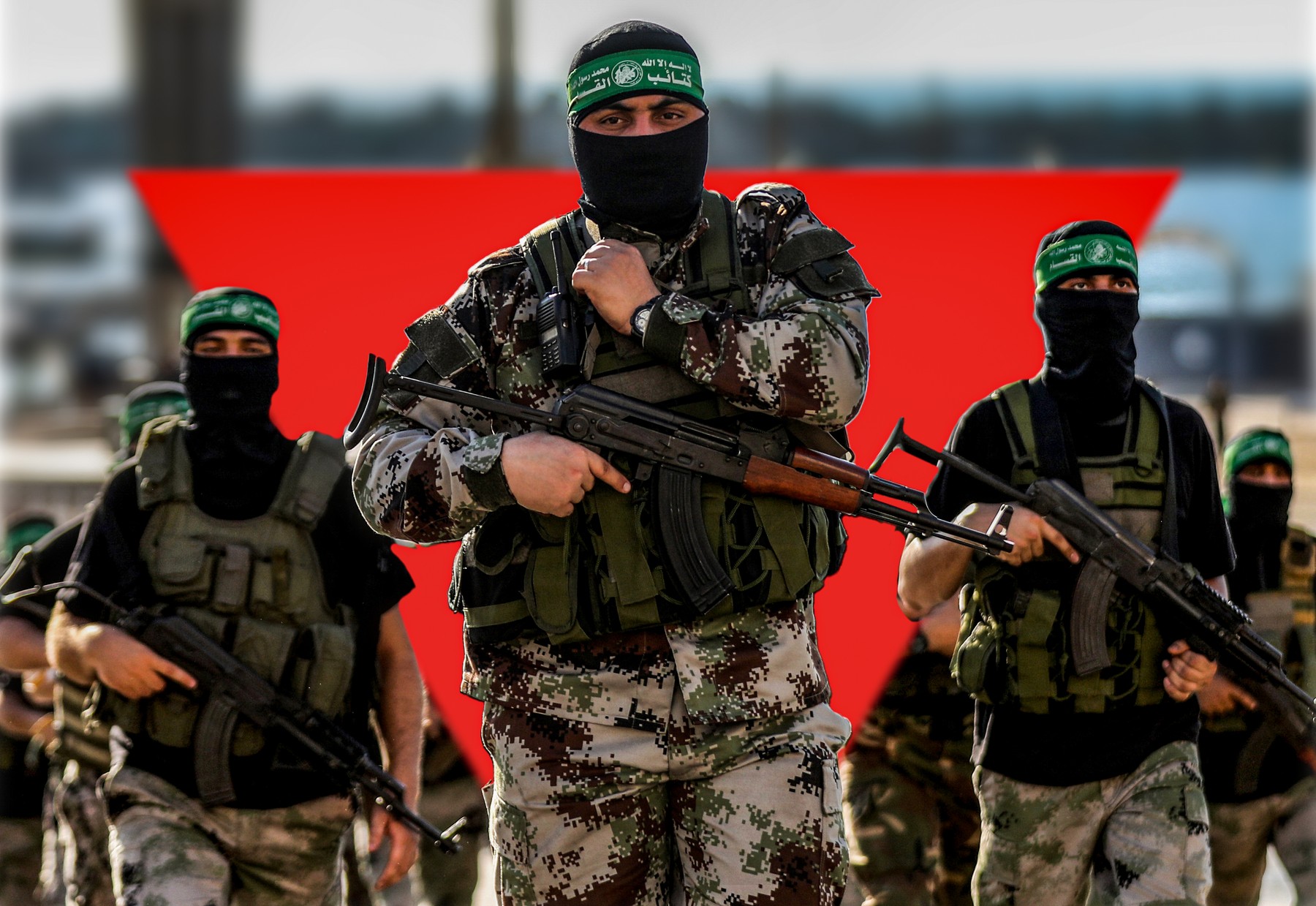 July 13, 2024, London, United Kingdom: A photomontage of Hamas militants in Gaza with a red inverted triangle in the background. The inverted red triangle has been used by Hamas' Al-Qassam Brigades to mark Israeli military targets in their videos of the ongoing fighting in the embattled Gaza Strip. Germany's House of Representatives has recently voted to ban the red inverted triangle symbol.,Image: 889503362, License: Rights-managed, Restrictions: , Model Release: no, Credit line: Ahmed Fesal Bayaa / Zuma Press / Profimedia