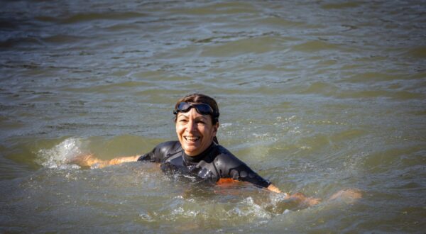 Paris Mayor Anne Hidalgo bathes and swims in a wetsuit and goggles in the Seine water at Bras Marie in Paris, France on July 17, 2024. Proof and swimming demonstration of the efforts made and spent by the City and the State to improve the quality of the water of the Seine, its bathability and the ecological state of the river which will host the open water swimming events during the Olympic and Paralympic Games JOP PARIS 2024.,Image: 890284341, License: Rights-managed, Restrictions: , Model Release: no, Credit line: Amaury Cornu / AFP / Profimedia