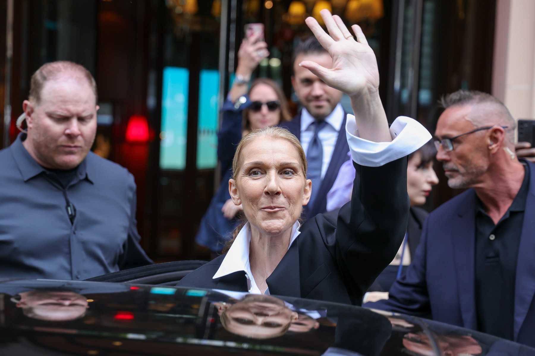 Paris, FRANCE  - Celine Dion is seen leaving the Royal Monceau hotel, signing autographs and waving to fans before preparing for the opening ceremony of the Olympic Games.

BACKGRID USA 23 JULY 2024,Image: 891741966, License: Rights-managed, Restrictions: RIGHTS: WORLDWIDE EXCEPT IN FRANCE, Model Release: no, Pictured: Celine Dion, Credit line: Aissaoui Nacer / BACKGRID / Backgrid USA / Profimedia