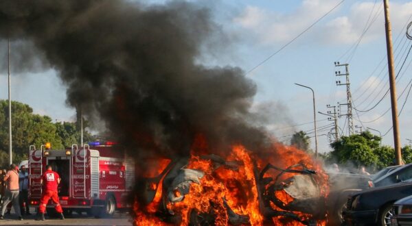 Firefighter arrive as a car burns following an Israeli strike in the southern Lebanese city of Sidon on August 9, 2024. A Lebanese security source said the Israeli strike on a vehicle in the southern city of Sidon killed a Hamas security official from the nearby Ain al-Helweh Palestinian refugee camp.,Image: 897393473, License: Rights-managed, Restrictions: , Model Release: no, Credit line: Mahmoud ZAYYAT / AFP / Profimedia