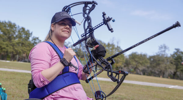 January 26, 2023, Tampa: Tracy Otto pauses during an archery practice session at All People's Life Center in Tampa, Florida in January. Otto, 27, was paralyzed from the chest down when an ex-boyfriend attacked her in 2019. She got into archery after the attack and is now aiming to compete in the 2024 Paralympics in Paris.,Image: 768352948, License: Rights-managed, Restrictions: , Model Release: no, Credit line: Ivy Ceballo / Zuma Press / Profimedia