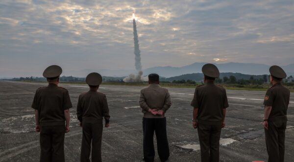 epa11613076 A photo released on 19 September 2024 by the official North Korean Central News Agency (KCNA) shows North Korean Kim Jong Un (C) overseeing the test fire of a new-type tactical ballistic missile Hwasongpho-11-Da-4.5 and an improved strategic cruise missile at an undisclosed location in North Korea, 18 September 2024. According to KCNA, North Korea successfully test-fired the new-type tactical ballistic missile and an improved strategic cruise missile on the same day. The new-type tactical ballistic missile, equipped with a 4.5-ton super-large conventional warhead, was tested to verify its accuracy at a medium range of 320 km and assess the explosive power of the warhead.  EPA/KCNA  EDITORIAL USE ONLY