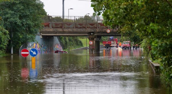 epa11613291 A car is trapped in the Celle underpass following the wave of bad weather that hit central Italy, in Rimini, Emilia-Romagna region, Italy, 19 September 2024. The low-pressure system Boris brought heavy rain to central and eastern Europe starting on 11 September 2024 with five times the average monthly rainfall for September within a few days according to the EU's Copernicus programme. Hundreds of thousands were evacuated from their homes across the region and more than twenty people died according to the latest reports from the countries affected.  EPA/DORIN MIHAI
