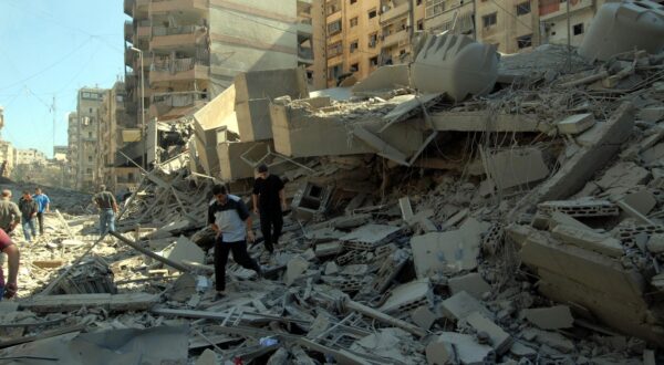BEIRUT, LEBANON - (ARCHIVE): A file photo dates August 14, 2006 shows people looking at the heavily damaged buildings, parts of which have collapsed due to Israeli attacks that continued for 34 days in Dahiya district of Beirut, Lebanon on August 14, 2006. Eyup Coskun / Anadolu/ABACAPRESS.COM,Image: 912669847, License: Rights-managed, Restrictions: , Model Release: no, Credit line: AA/ABACA / Abaca Press / Profimedia